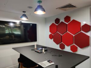 Commercial Unit Soundproofing with Red Hexgonal Shaped Acoustical Boards